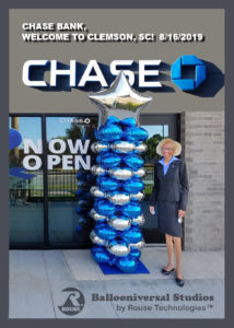 Grand opening photo of new Chase Bank and branch manager August 6, 2019